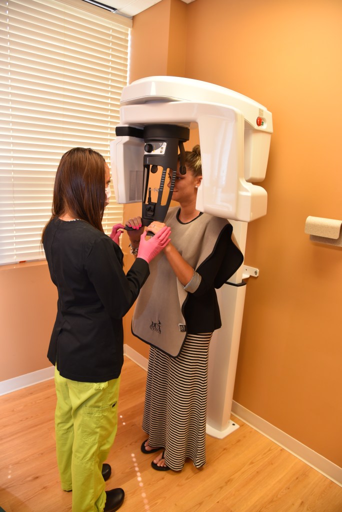 Somebody receiving a 3D full mouth scan
